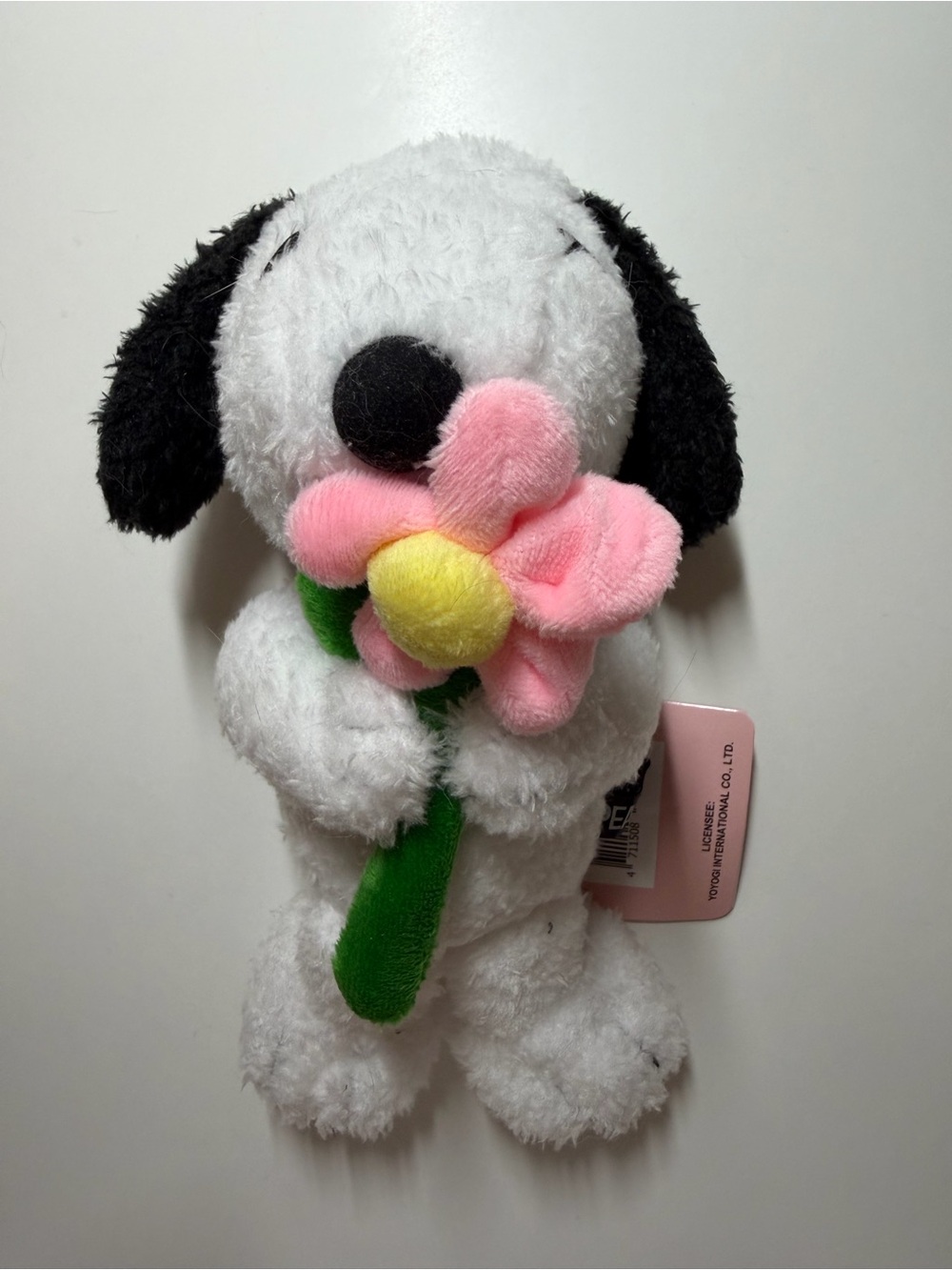Snoopy Plush Holding Pink Flower